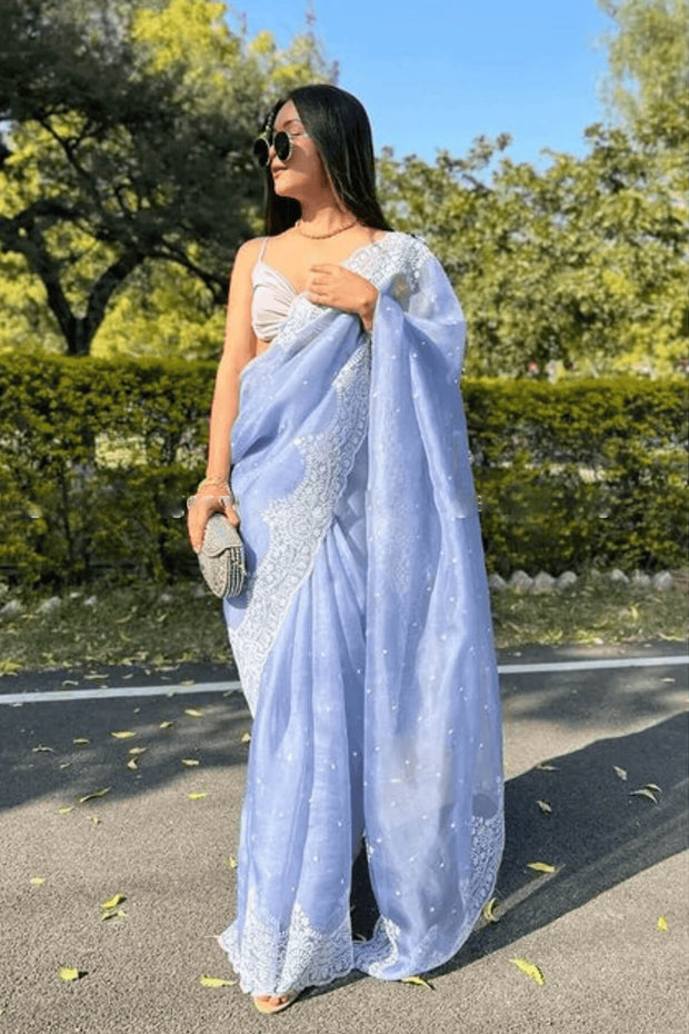 Organza saree in lilac blue with chikan  work