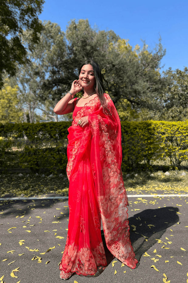 Printed organza saree in red in floral pattern