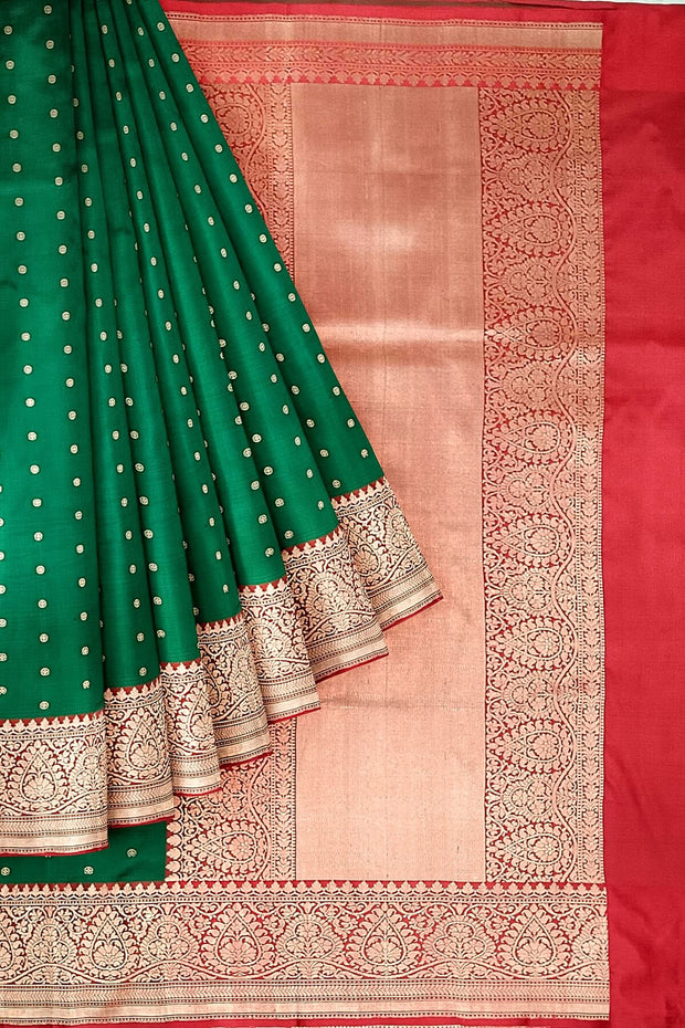 Handloom Banarasi katan pure silk saree in  bottle green with small motifs