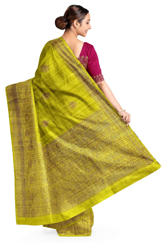 Handloom Banarasi katan pure silk saree in mehndi green in dupion finish with floral motifs .