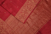 Handloom Banarasi katan pure silk saree in maroon in dupion finish with small motifs .