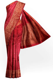 Handloom Banarasi katan pure silk saree in maroon in dupion finish with small motifs .