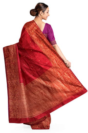 Handloom Banarasi katan pure silk saree in maroon in dupion finish with small motifs .