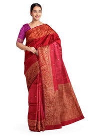 Handloom Banarasi katan pure silk saree in maroon in dupion finish with small motifs .