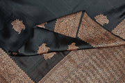 Handloom Banarasi katan pure silk saree in black in dupion finish with floral motifs .