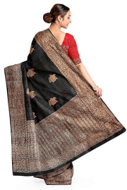 Handloom Banarasi katan pure silk saree in black in dupion finish with floral motifs .