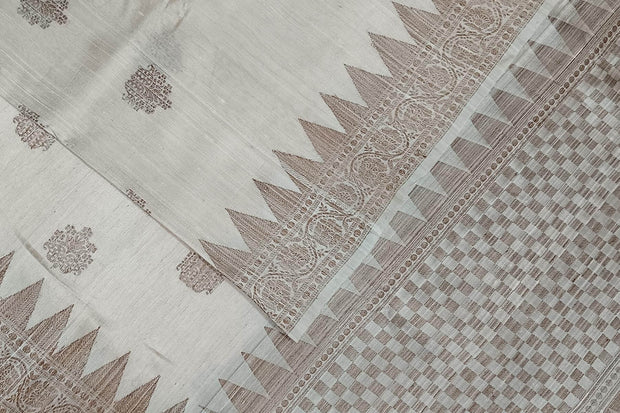 Handloom Banarasi katan pure silk saree in off white in dupion finish with floral motifs.