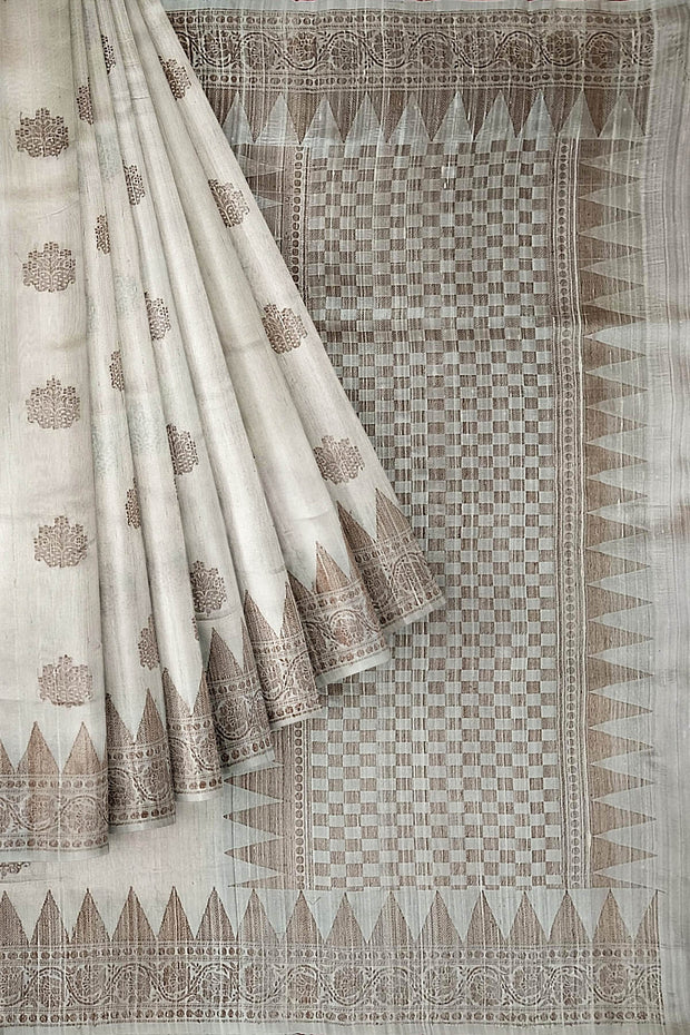 Handloom Banarasi katan pure silk saree in off white in dupion finish with floral motifs.