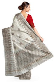 Handloom Banarasi katan pure silk saree in off white in dupion finish with floral motifs.