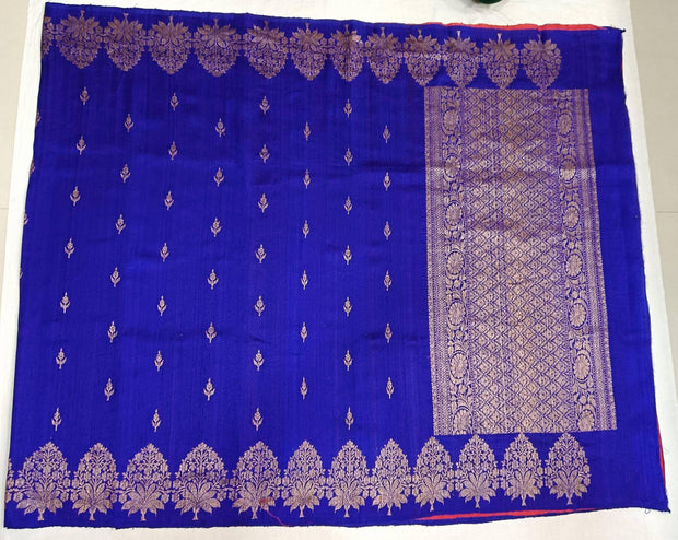 Handloom Banarasi katan pure silk saree in royal blue in dupion finish with floral motifs .