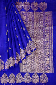 Handloom Banarasi katan pure silk saree in royal blue in dupion finish with floral motifs .