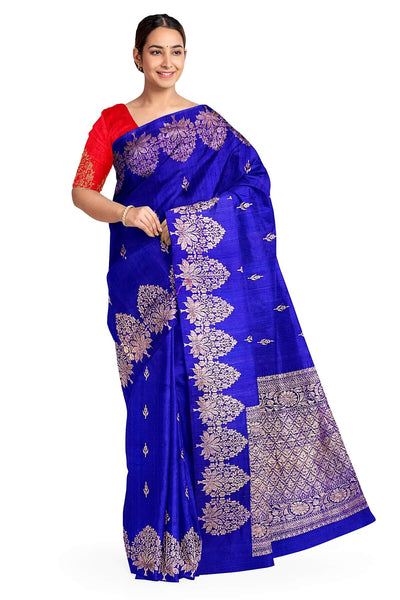 Handloom Banarasi katan pure silk saree in royal blue in dupion finish with floral motifs .