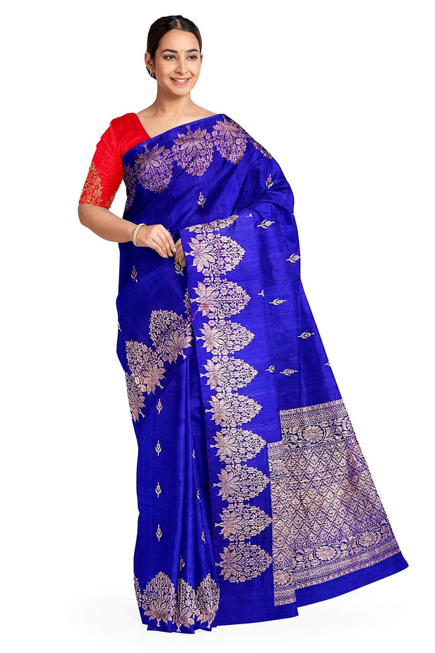 Handloom Banarasi katan pure silk saree in royal blue in dupion finish with floral motifs .