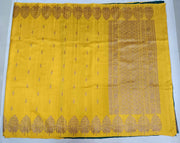 Handloom Banarasi katan pure silk saree in yellow in dupion finish with floral motifs.