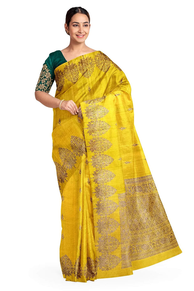 Handloom Banarasi katan pure silk saree in yellow in dupion finish with floral motifs.