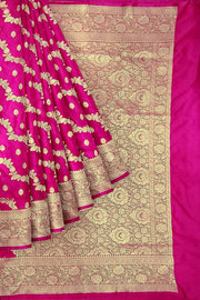 Banarasi mashru silk saree in  pink in leheriya pattern with motifs and a  contrast pallu.