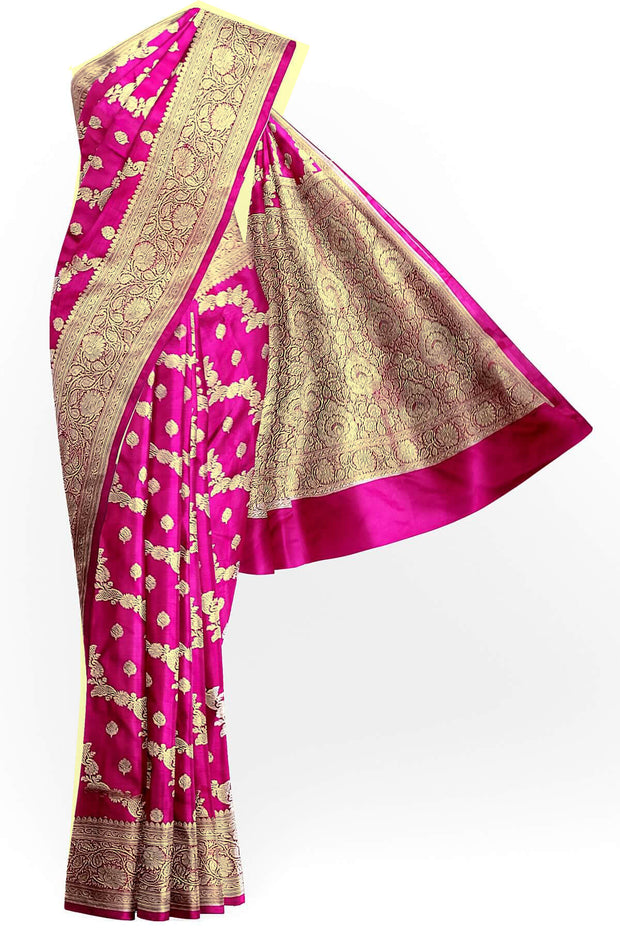 Banarasi mashru silk saree in  pink in leheriya pattern with motifs and a  contrast pallu.