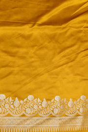 Banarasi mashru silk saree in  mustard in leheriya pattern with motifs .