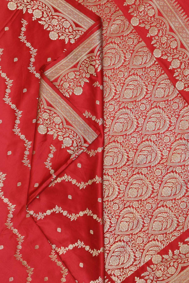 Banarasi mashru silk saree in  magenta in leheriya pattern with motifs .