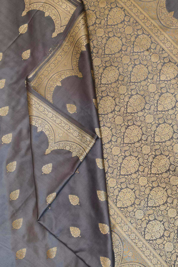 Banarasi mashru silk saree in  grey  with floral motifs