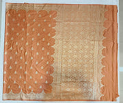 Banarasi mashru silk saree in  peach  with floral motifs