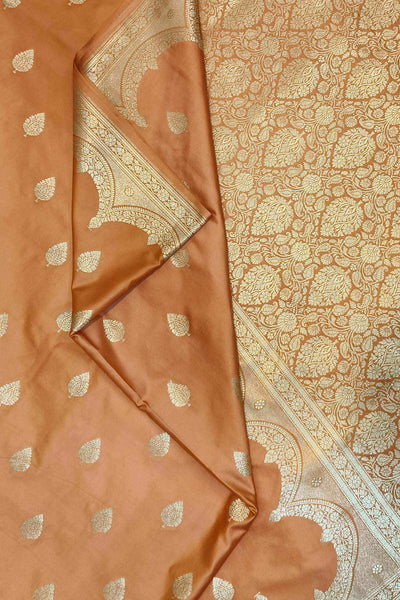 Banarasi mashru silk saree in  peach  with floral motifs