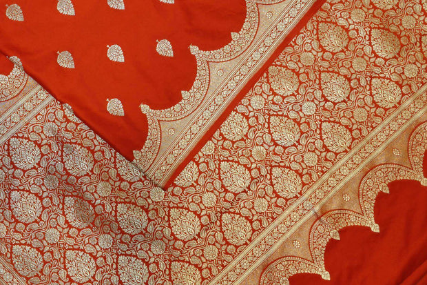 Banarasi mashru silk saree in  red  with floral motifs