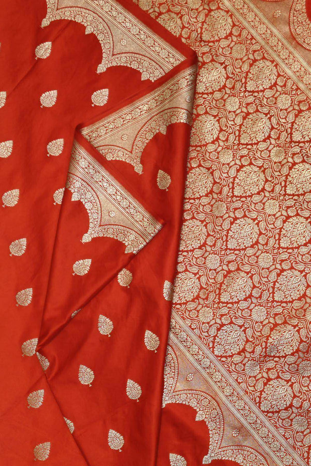 Banarasi mashru silk saree in  red  with floral motifs