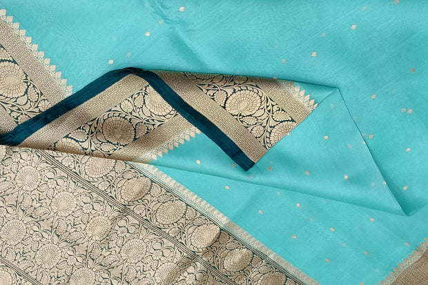Banarasi kora ( organza) silk saree  in sky blue with small buttis all over the body