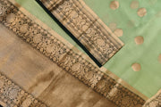 Banarasi kora ( organza) silk saree in pista green with motifs