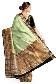 Banarasi kora ( organza) silk saree in pista green with motifs