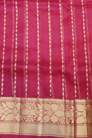 Banarasi kora ( organza) silk saree in purple with  gold motifs.