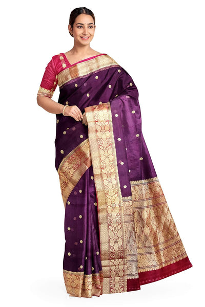 Banarasi kora ( organza) silk saree in purple with  gold motifs.