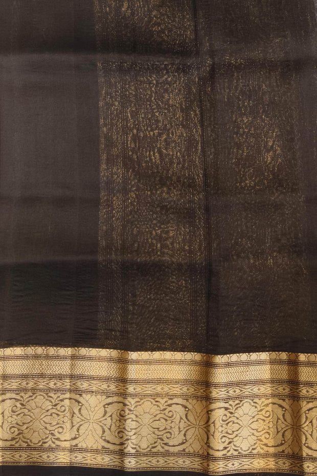 Banarasi kora ( organza) silk saree in grey with  gold motifs.