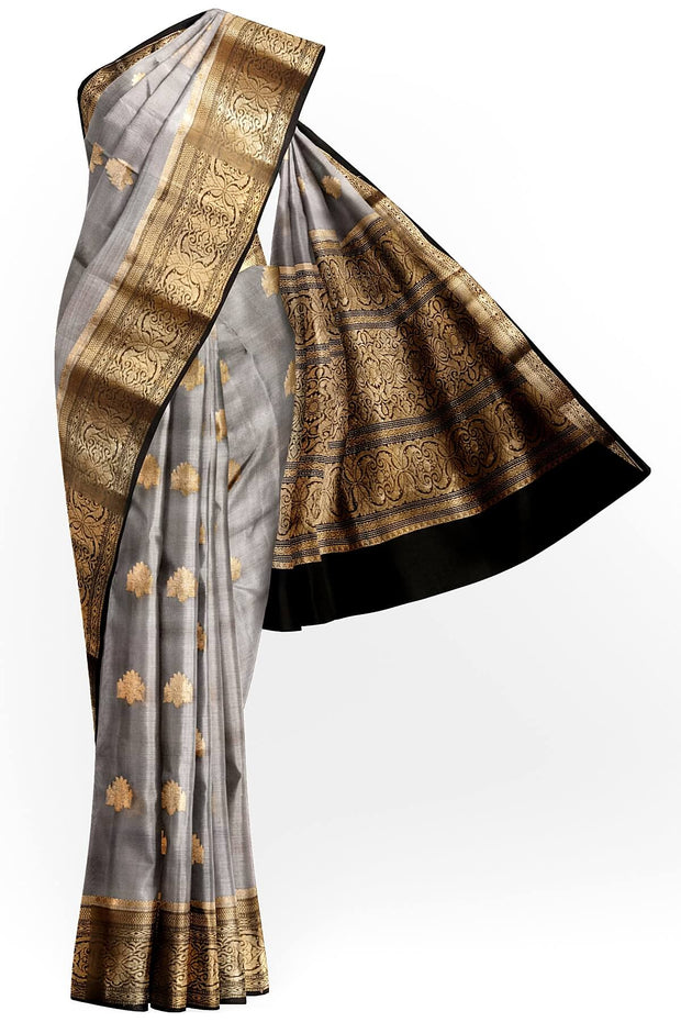 Banarasi kora ( organza) silk saree in grey with  gold motifs.