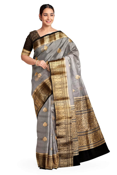 Banarasi kora ( organza) silk saree in grey with  gold motifs.