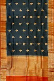 Banarasi kora ( organza) silk saree in black with  gold motifs.