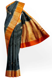 Banarasi kora ( organza) silk saree in black with  gold motifs.