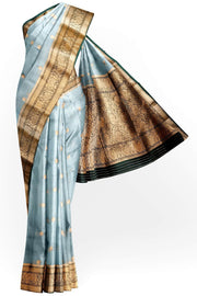 Banarasi kora ( organza) silk saree in sky blue with  gold motifs.