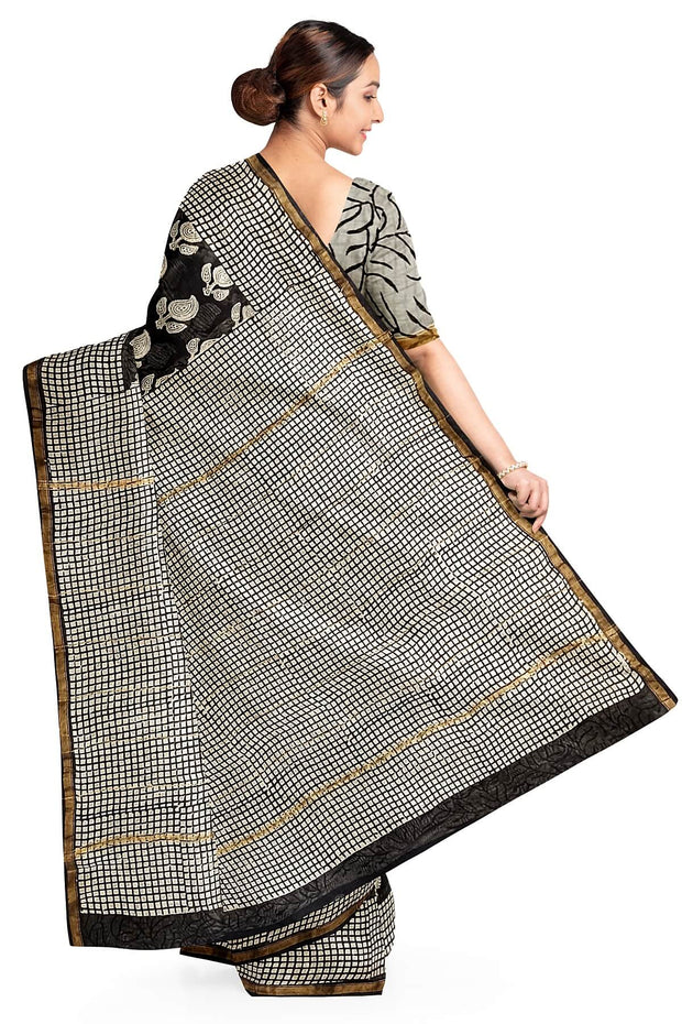 Hand block Bagru print on Chanderi silk cotton saree in black with leaves& floral motis