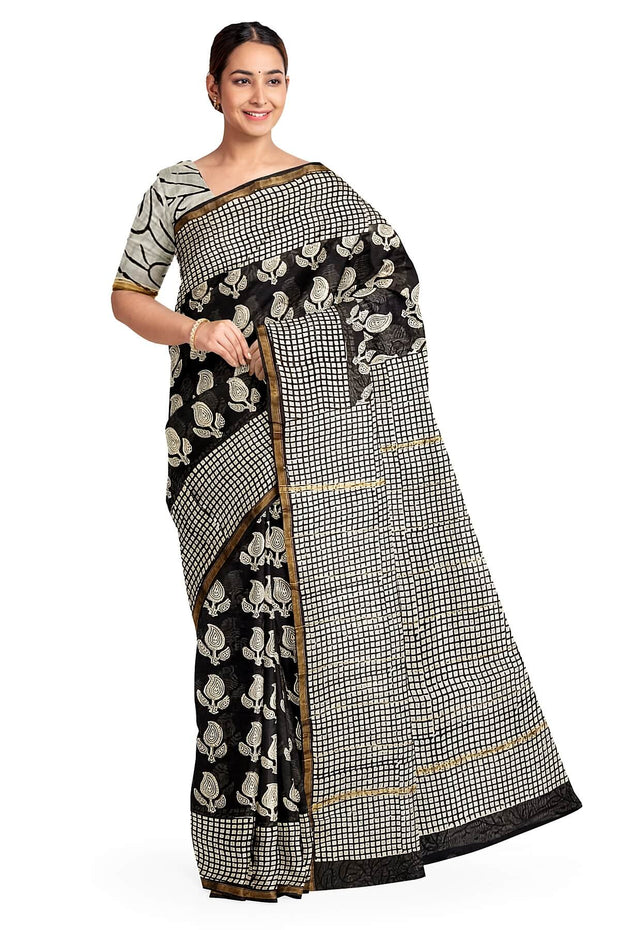 Hand block Bagru print on Chanderi silk cotton saree in black with leaves& floral motis