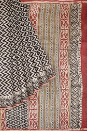 Hand block Bagru print on Chanderi silk cotton saree in off white with zig zag pattern