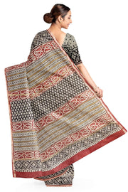 Hand block Bagru print on Chanderi silk cotton saree in off white with zig zag pattern