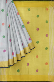 Handloom  cotton  saree  in white with polka dots &  tissue border