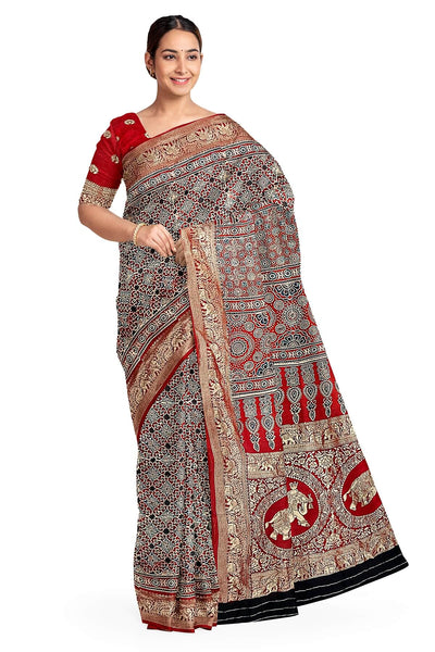 Dola silk saree in  floral  motifs  in red
