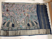 Dola silk saree with floral vines & peacocks in grey