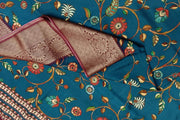 Dola silk saree in floral vines in prussian blue