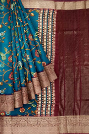 Dola silk saree in floral vines in prussian blue