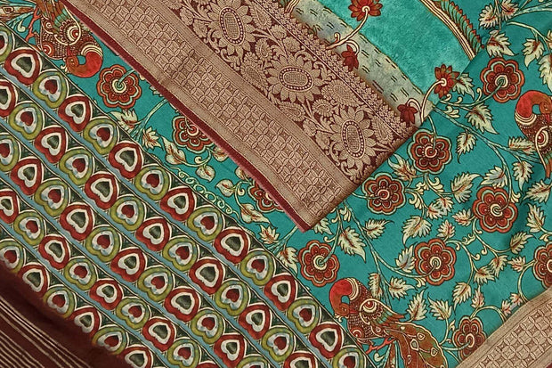 Dola silk saree with floral vines & peacocks in green