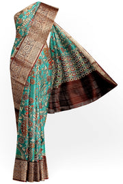 Dola silk saree with floral vines & peacocks in green